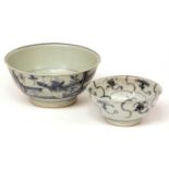 Two Chinese blue and white porcelain shipwreck bowls, both with Nagel Tek Sing auction stickers, the