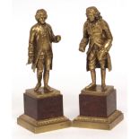 Two 19th century gilt bronze figures of statesmen, one clutching a scroll in his right hand, each