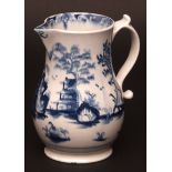 A large Lowestoft jug c1765 painted in tones of light and dark blue with a three tiered pagoda set