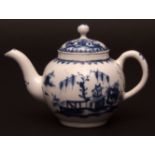 A Lowestoft teapot and cover c1764 decorated with a house and tree and Chinese river scenes within a