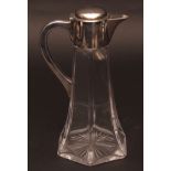 Late Victorian silver mounted and clear cut glass claret jug, the clear body of hexagonal trumpet