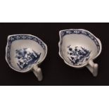 Two Lowestoft butter-boats c1770 of deep leaf shape with twig handles painted with a Chinese