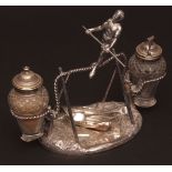 Late 19th century electro-plated three-piece cruet stand modelled in the form of a tightrope