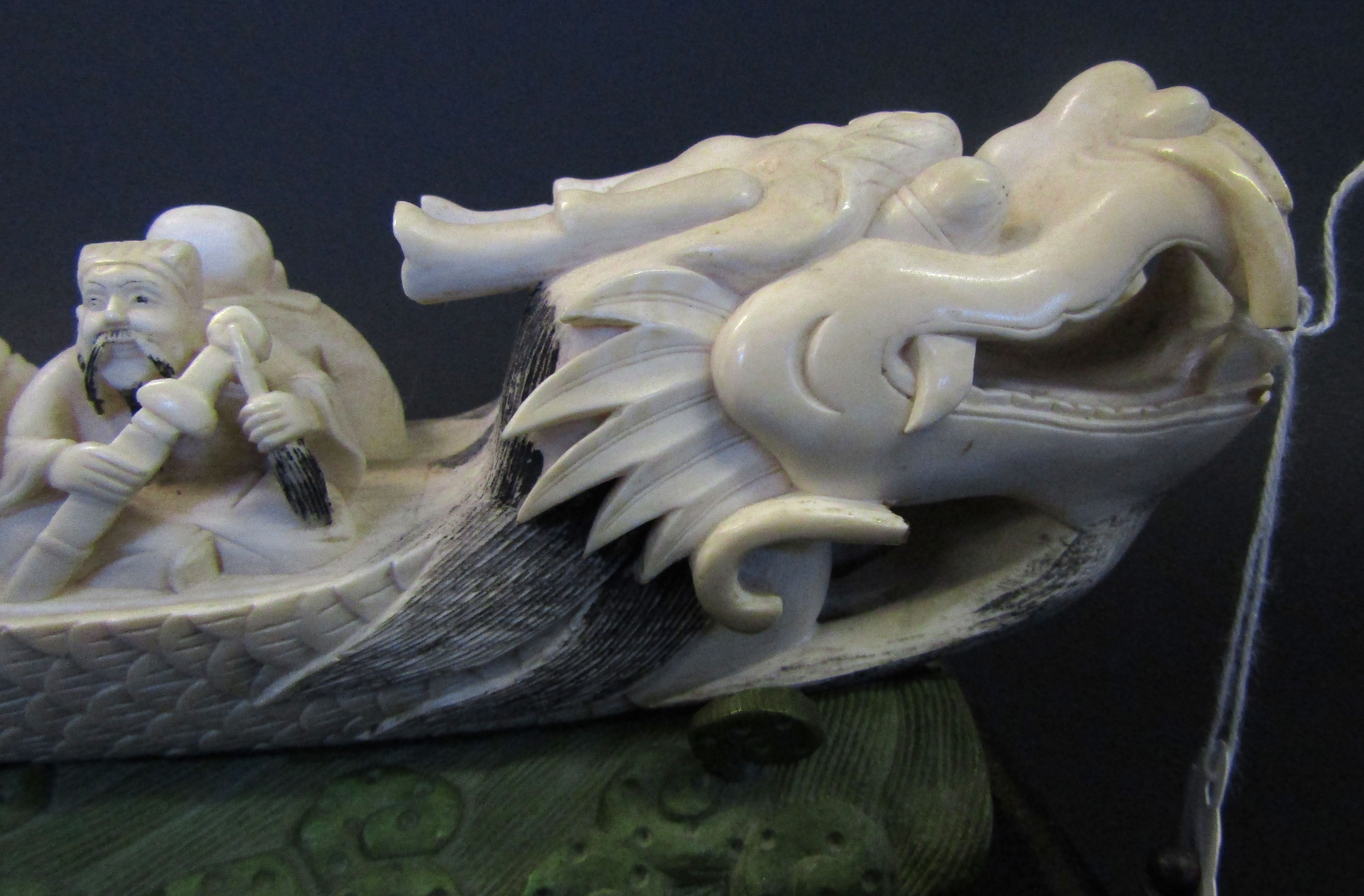 Chinese ivory carving of the lucky gods aboard a dragon pleasure boat set upon a green stained - Image 7 of 11