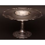 George V footed bowl, of shaped and polished circular form with applied rim, knopped stem and