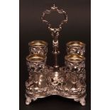 Late 19th century electro-plated egg stand, the quatrefoil shaped base with pierced gallery on