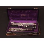 F Loree Paris oboe of ebonised construction with silver plated mounts in a fitted plush lined