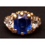 Late 19th century sapphire and diamond ring, the central oval facetted blue sapphire approx 4.