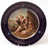 Vienna circular plate, the centre decorated with scene of two boys picnicking with a dog within a