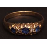 18ct gold sapphire and diamonds five-stone ring, set alternately with circular cut facetted