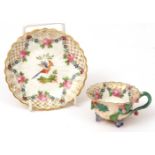 19th century French small cabinet cup and saucer, border painted in colours with floral garlands and