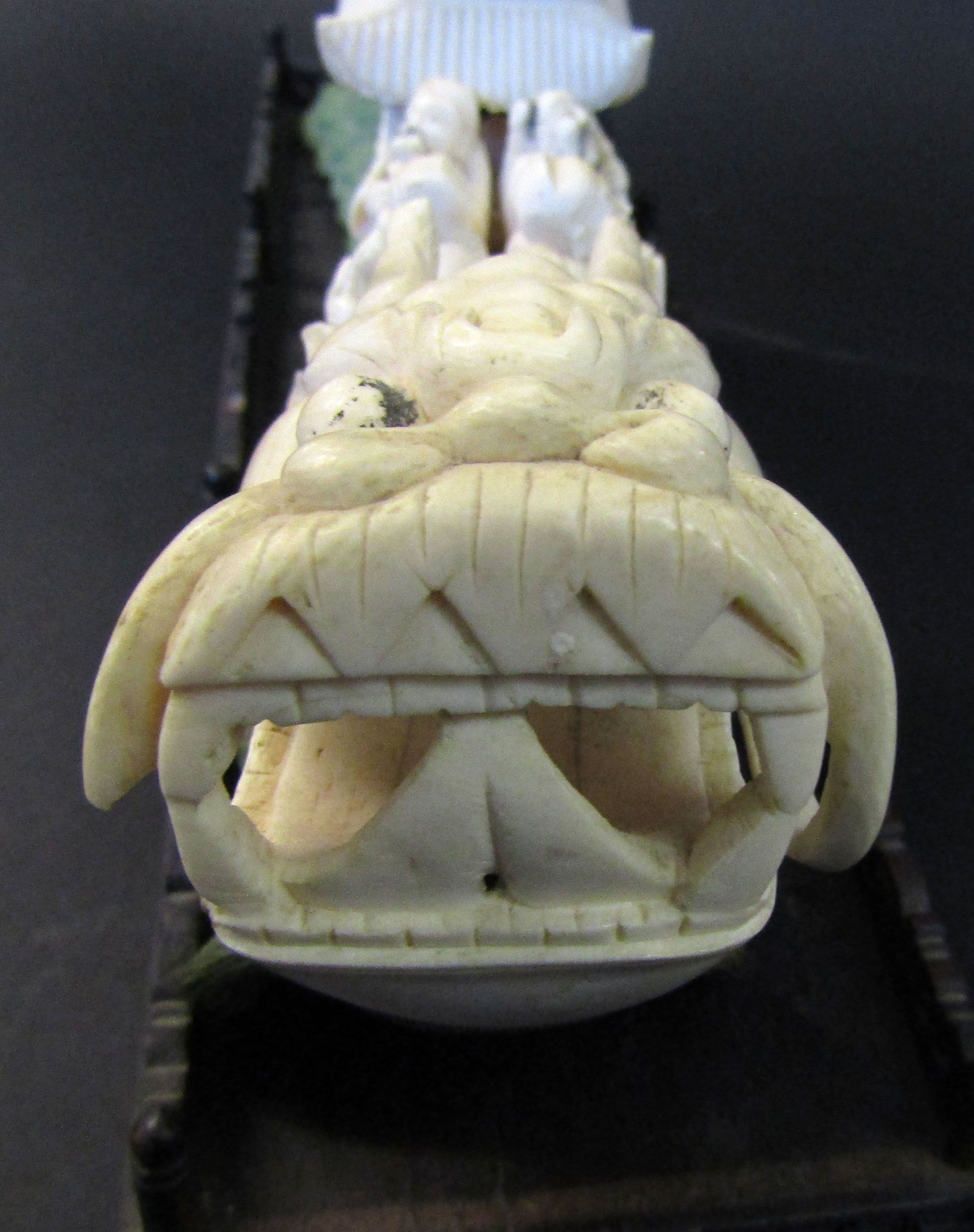 Chinese ivory carving of the lucky gods aboard a dragon pleasure boat set upon a green stained - Image 9 of 11