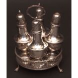 George III cruet stand of circular form, with pierced gallery bearing contemporary armorial and