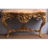 19th century giltwood and gesso console table of serpentine form with a veined marble top over a