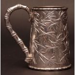 Mid-19th century Chinese silver tankard, the tapering cylindrical body decorated throughout with