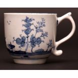 A rare Lowestoft cup c1765 painted in light blue tone with a Chinese landscape scene of a man behind