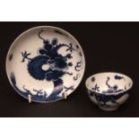 A Lowestoft tea bowl & saucer decorated with the so called dragon pattern of a sinuous dragon