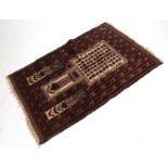 Caucasian style small rug, central geometric panel, mainly brown and beige field, together with a