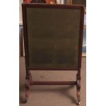 19th century mahogany screen of rectangular form with adjustable rising central panel, inset with