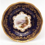 19th century Coalport cabinet plate of shaped circular form, the centre painted in colours of a