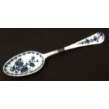 An extremely rare Lowestoft spoon c1770 painted with floral sprays within a meandering scroll and
