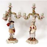 Pair of Plaue or Sitzendorf four-light candelabra, the stems all encrusted with flowers and the