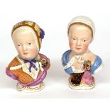 Pair of Meissen small head and shoulders busts of peasant women, each wearing bonnets and