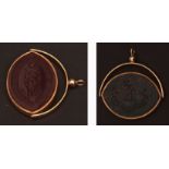 Victorian 18ct gold framed swivel fob, with two oval shaped engraved tablets, the agate engraved