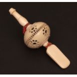 Late 19th century child's ivory rattle, fitted with a whistle to a pierced baluster mid-section