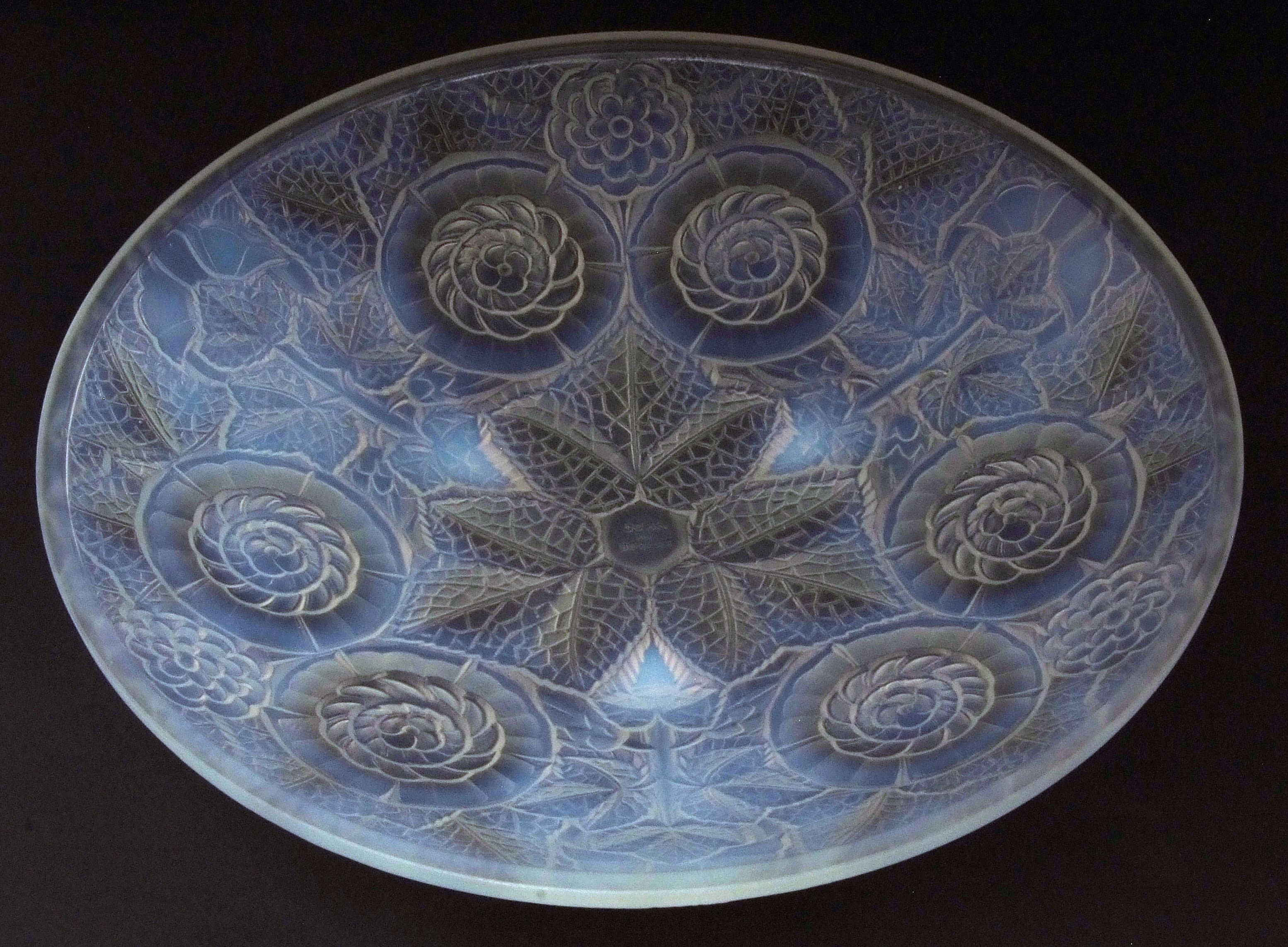 French opalescent glass shallow circular bowl, heavily embossed in the Lalique manner with