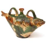 Large Majolica type pottery candlestick in the form of a fish, the top with central sconce flanked