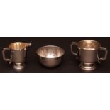 Mixed Lot: George V sugar basin and milk jug, of polished circular form with hollow cast and applied