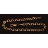 Modern 9ct gold curb link bracelet, 210mm long with a trigger clasp, 9gms, import marks for