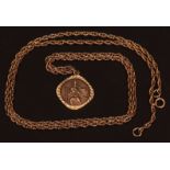Late 20th century 9ct gold St Christopher and chain, the circular shaped St Christopher set in a