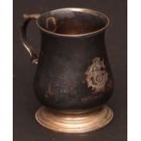 George III tankard of small proportions, the plain polished baluster body with later monogrammed