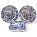 Pair of blue printed circular plates and a dish, decorated with the "Grazing Rabbits" pattern, 8 1/2