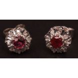 20th century pair of 18ct gold white gold and diamond cluster stud earrings, each with a round