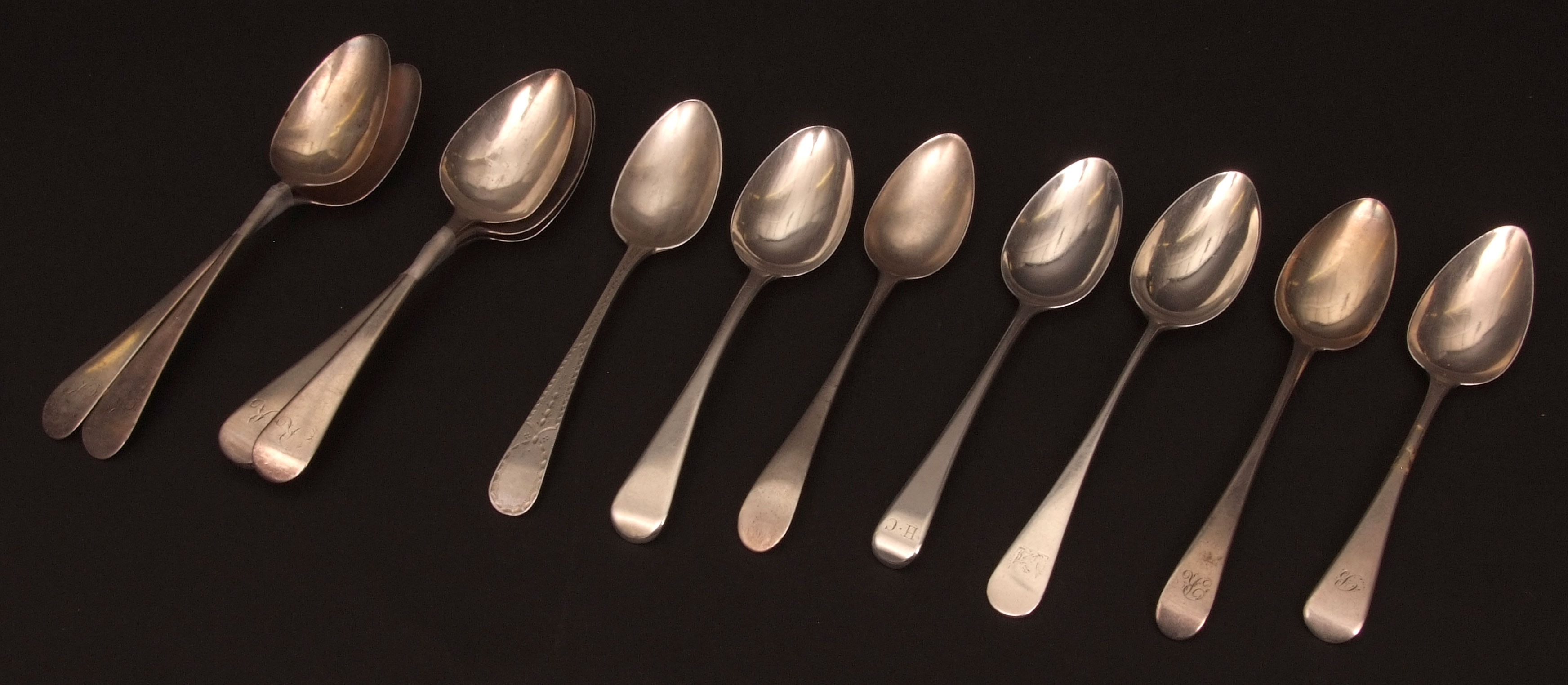 Mixed Lot: three various Old English pattern dessert spoons, together with nine further various