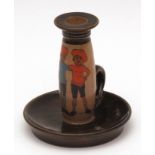 Royal Doulton series ware chamber candlestick, the stem decorated in colours with a titled scene "