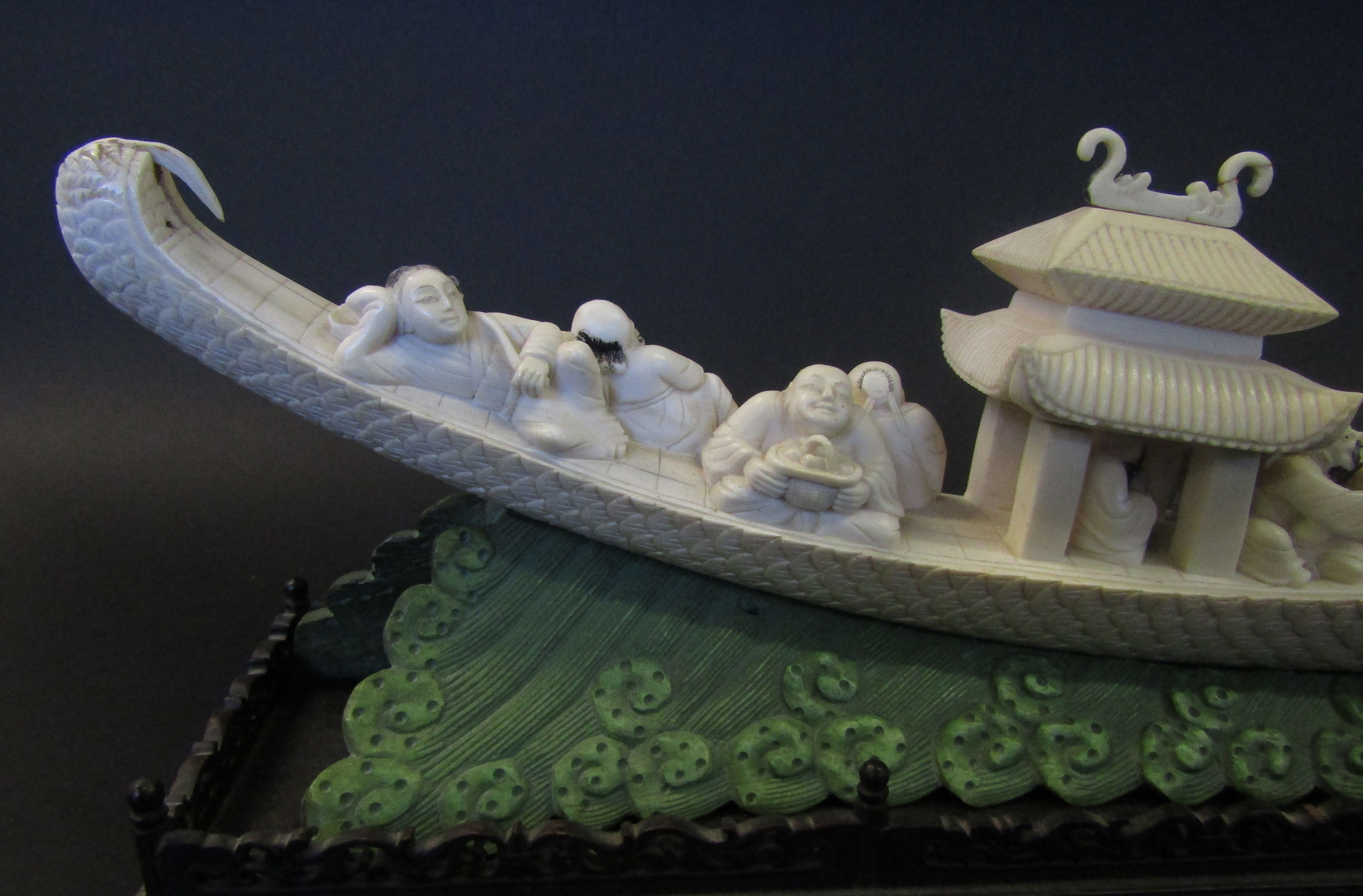 Chinese ivory carving of the lucky gods aboard a dragon pleasure boat set upon a green stained - Image 5 of 11