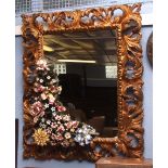Art Deco style gilt framed large decorative mirror, encrusted with an extensive panel of composition
