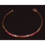 Modern yellow metal bracelet, ruby and diamond set, 19cm long