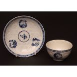 A Lowestoft tea bowl & saucer c1765 with Hughes type moulding of flowers and leaves within a