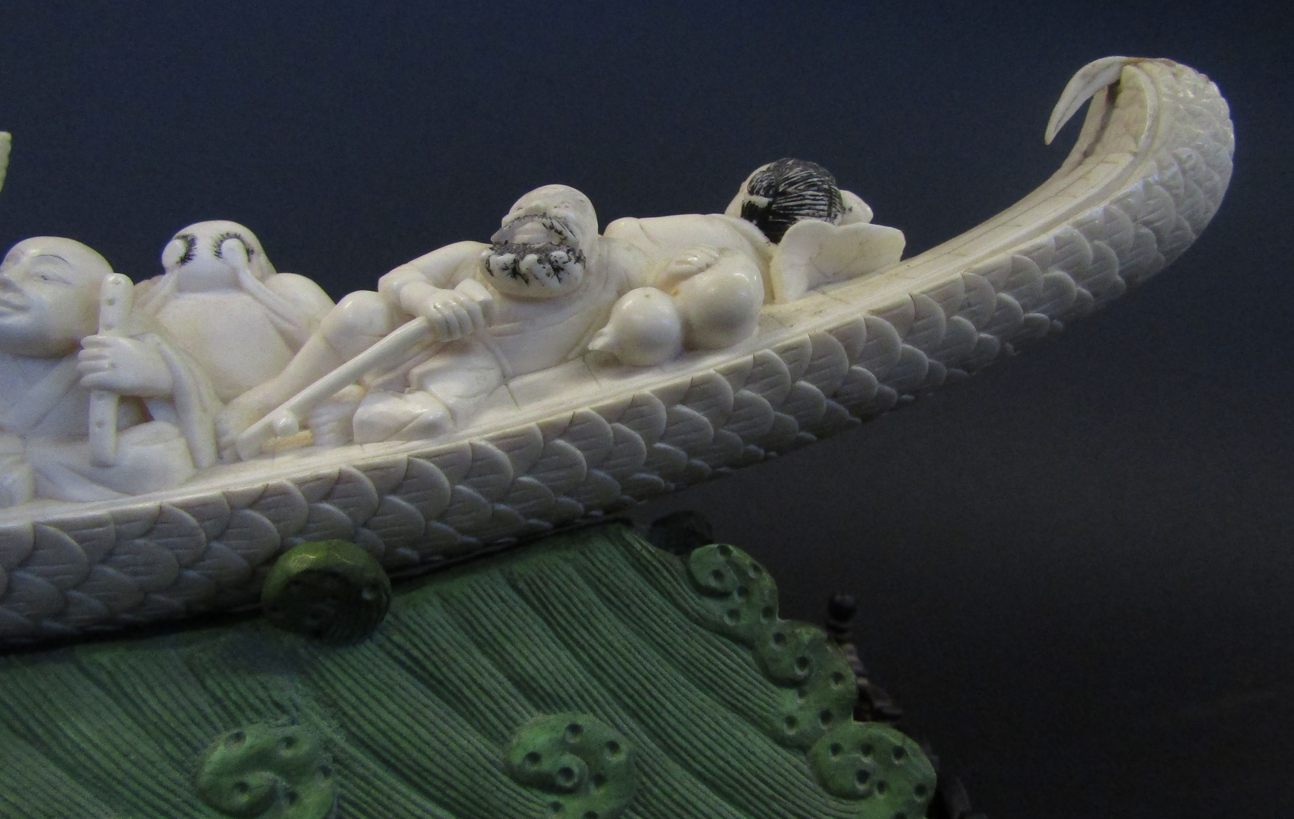 Chinese ivory carving of the lucky gods aboard a dragon pleasure boat set upon a green stained - Image 4 of 11