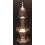 George V table caster, on facetted octagonal baluster form with pierced pull-off cover with cast and