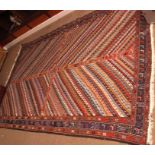 Caucasian woolwork carpet/wall hanging, triple gull border, central panel of diagonal geometrical