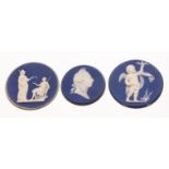 Collection of three early Wedgwood blue Jasper plaques all of circular form, one moulded with