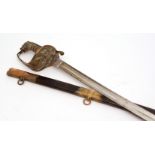 British, late 19th century Naval sword, with Gothic brass hilt and crowned anchor with lions mask