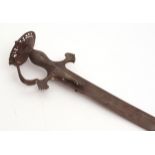 India, 19th century Talwar, with cast hilt with pierced disc pommel and hand guard to a curved and
