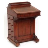 Victorian mahogany davenport, the back fitted with a slightly raised stationery compartment over